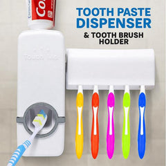 White toothpaste dispenser and toothbrush holder with colorful toothbrushes on a beige background